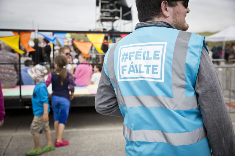 Designer Ciaran O'Melia wearing one his own high-vis #FéileFáilte jackets